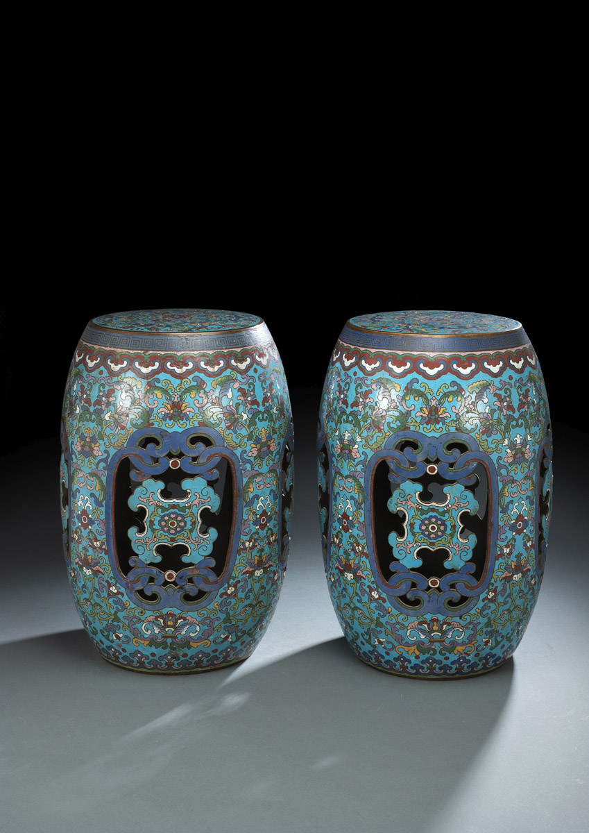 A RARE PAIR OF CHAMPLEVÉ ENAMEL OPENWORK BARREL-FORM STOOLS