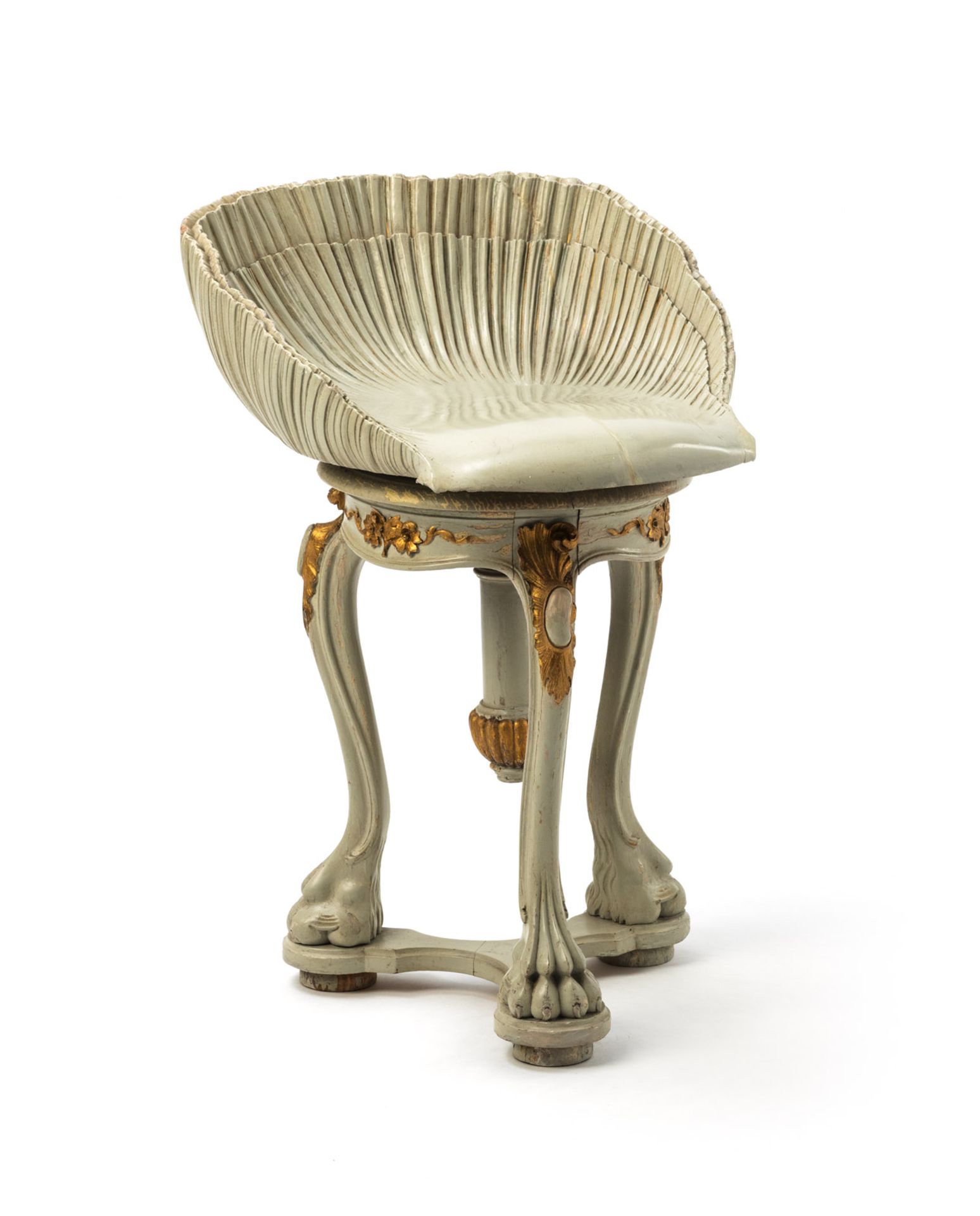 A BAROQUE STYLE PIANO STOOL WITH SHELL SHAPED SEAT