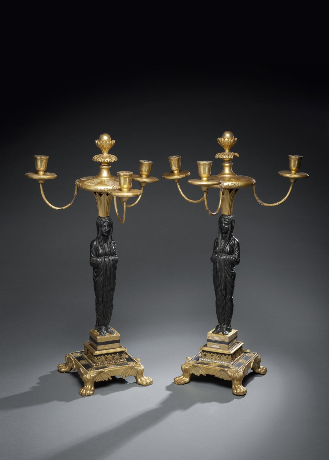 A PAIR OF WOOD AND STUCCO EMPIRE CANDELABRA