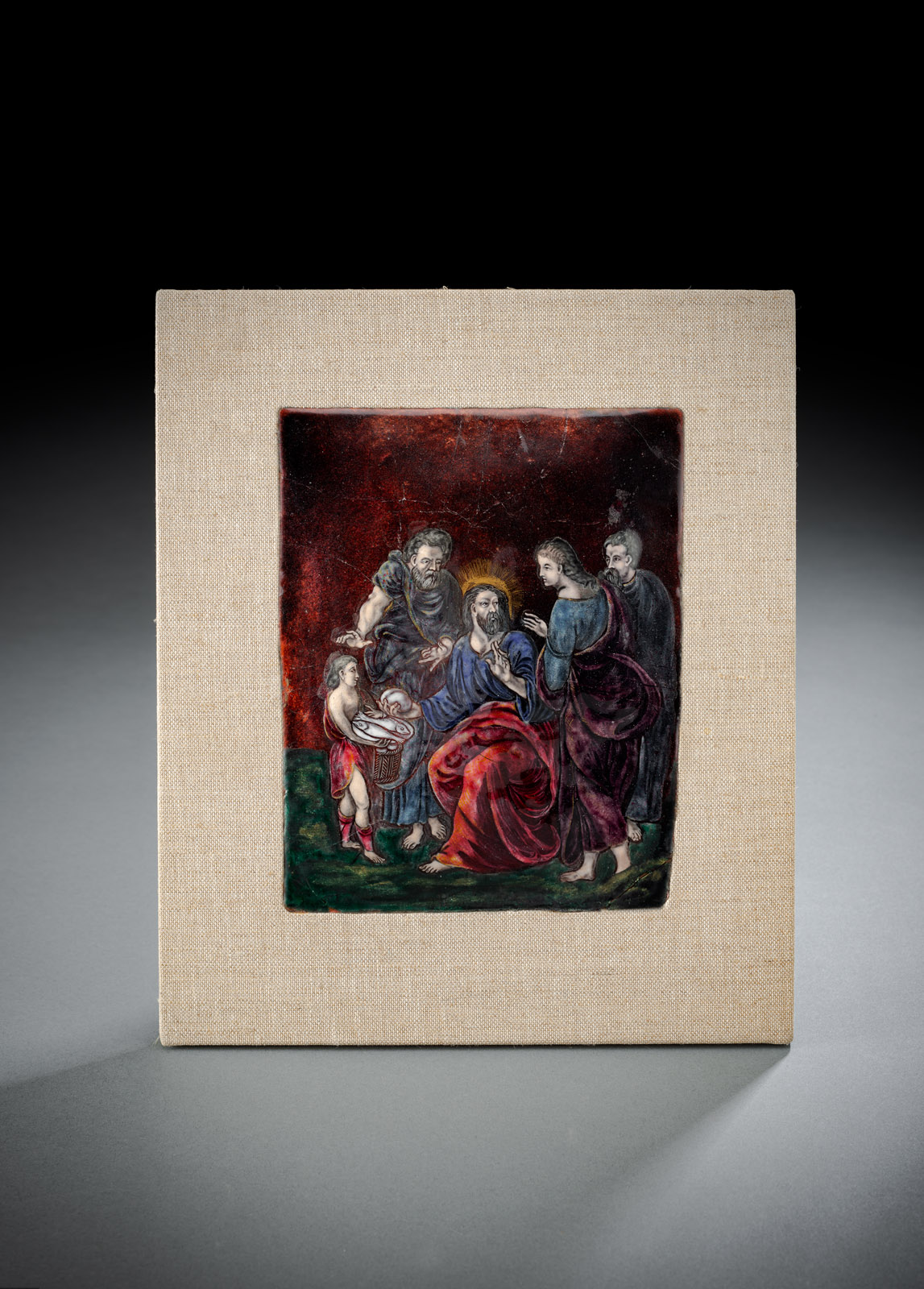 A LIMOGES ENAMELLED PLAQUE WITH BIBLICAL SCENE DEPICTING THE MULTIPLICATION OF THE LOAVES