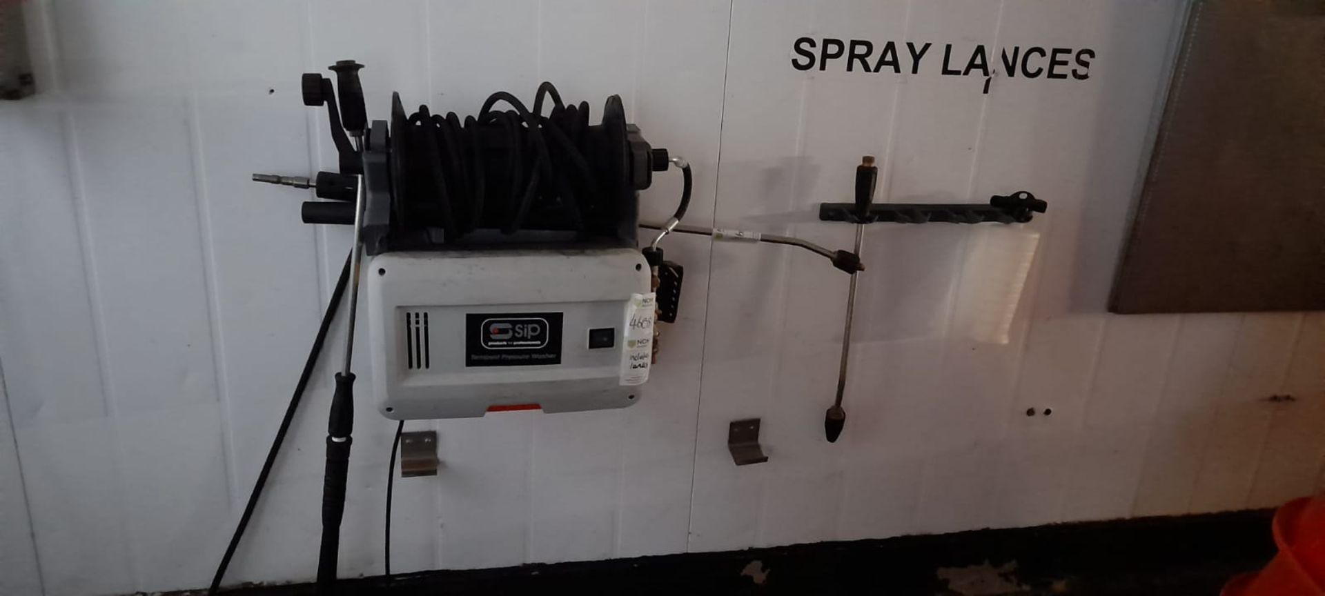 Wall mounted pressure washer