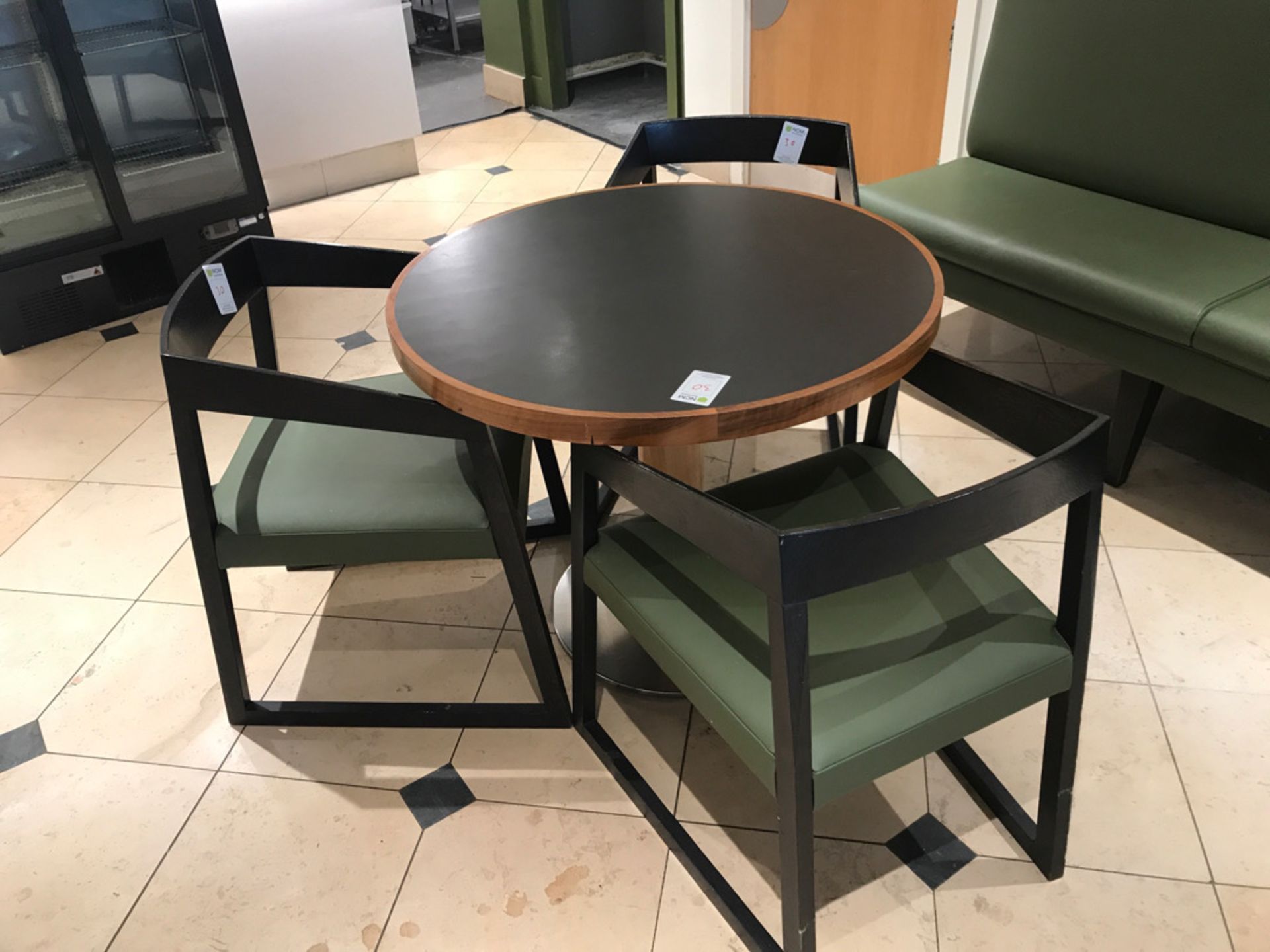 Modern pedestal table with three designer chairs