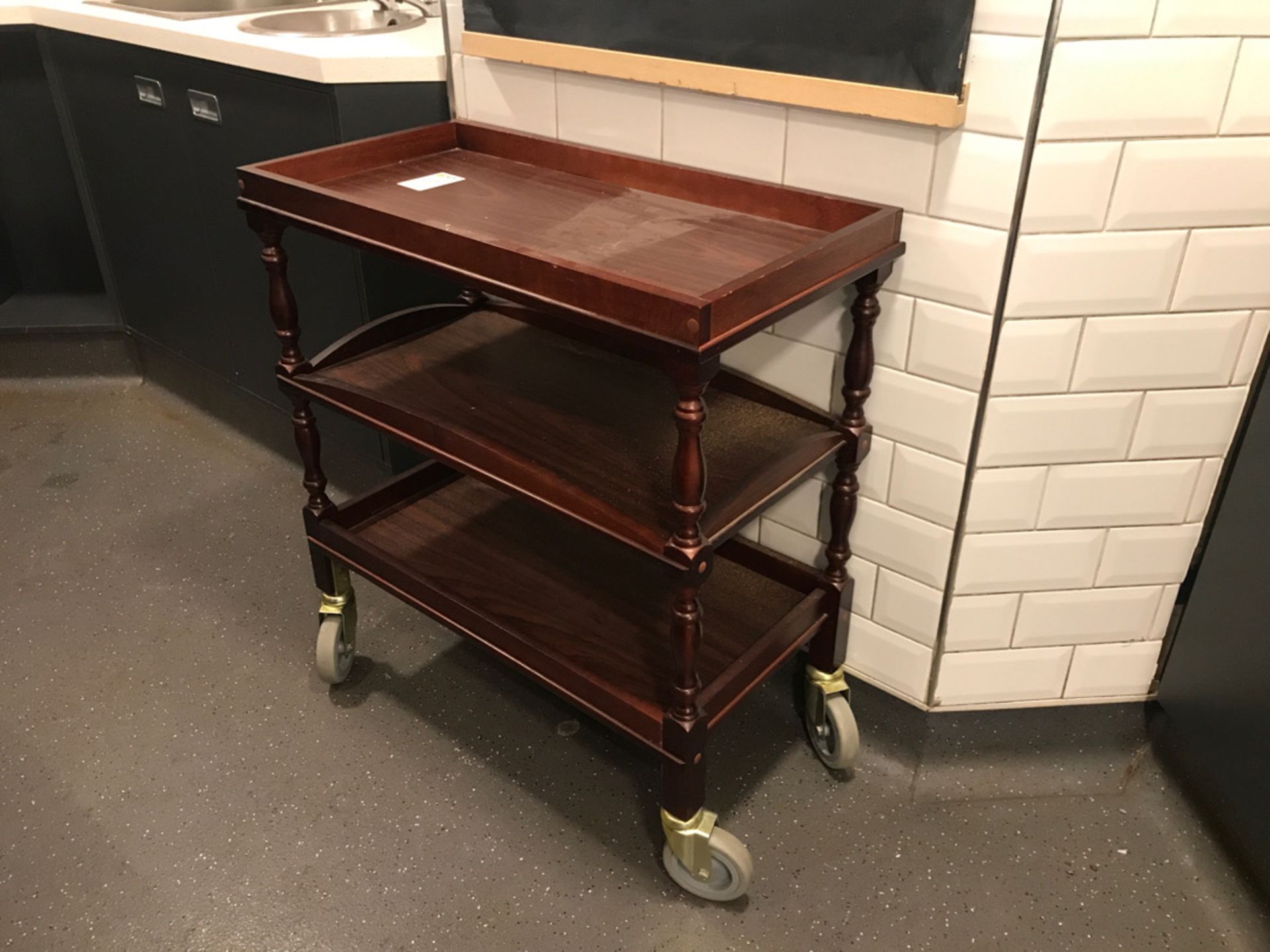 Three tier wooden wheeled serving trolley