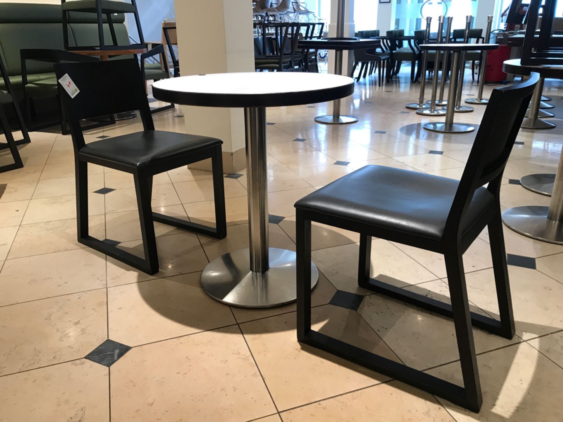 Pedestal table with two chairs