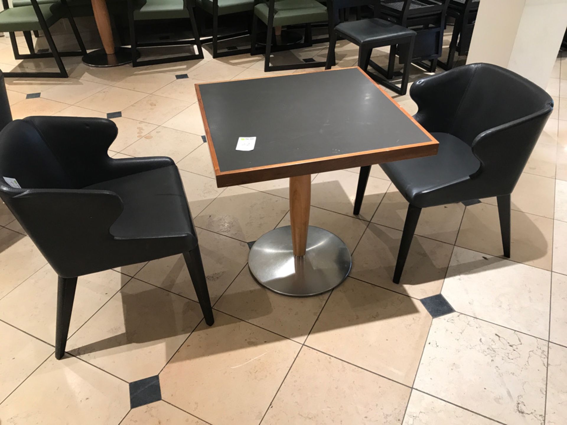 Modern pedestal table with two chairs