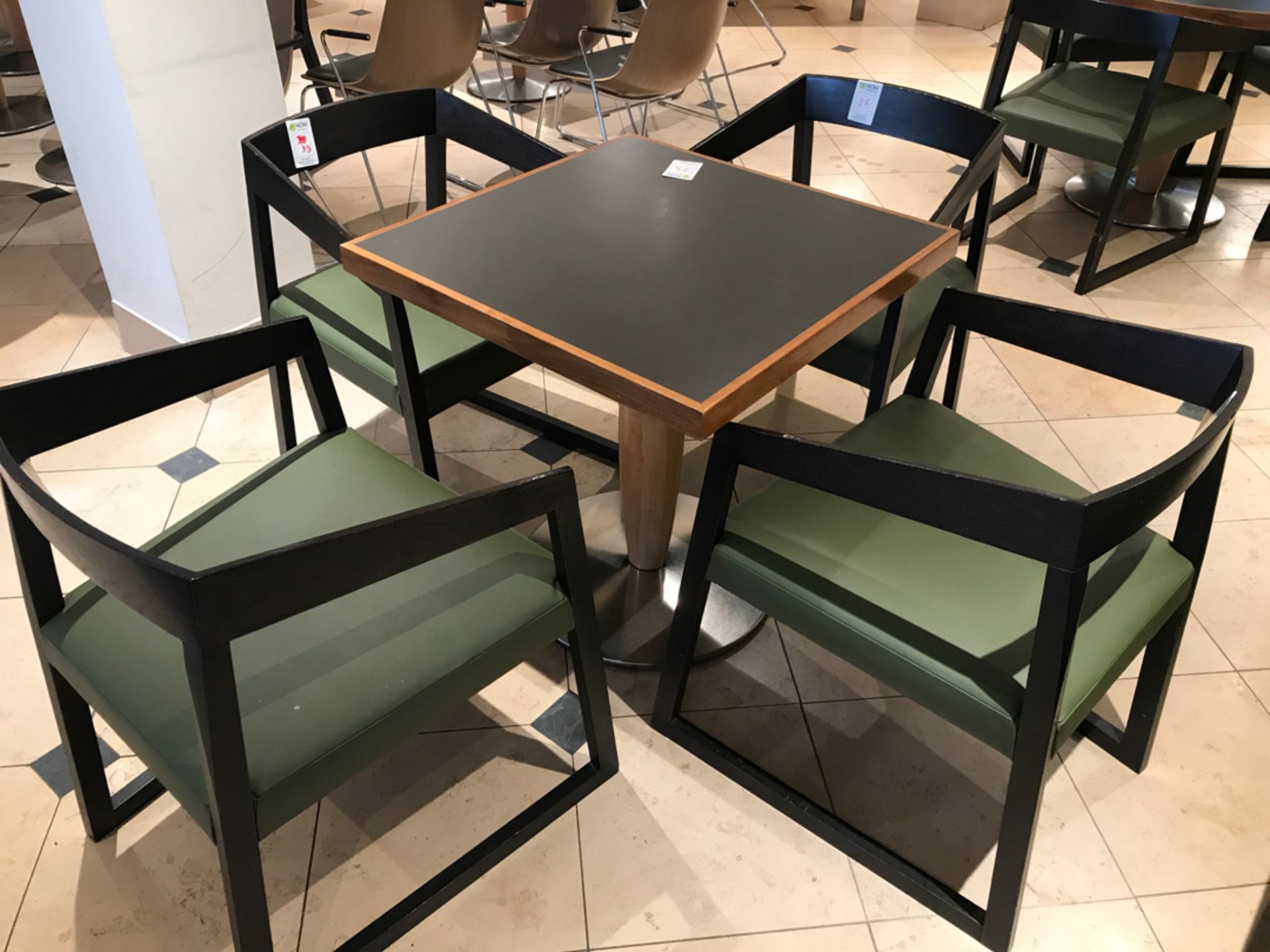 Modern pedestal table with four chairs