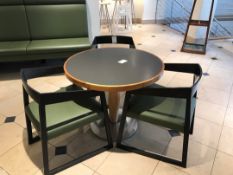 Modern pedestal table with three designer chairs