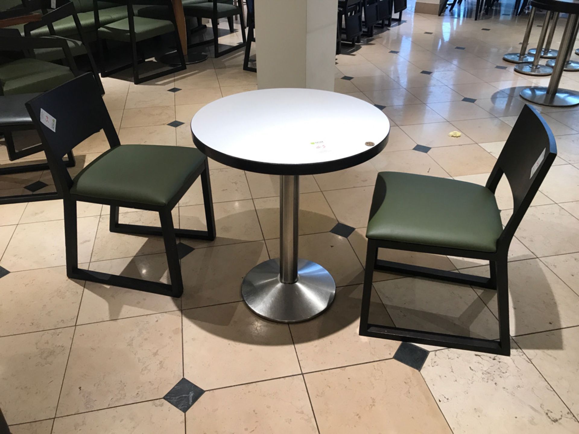 Small pedestal table with two chairs