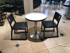 Modern pedestal table with two chairs