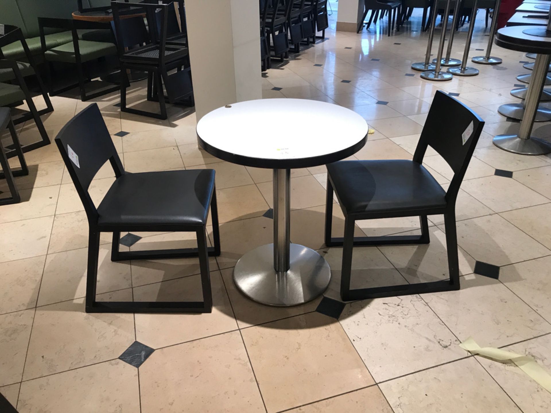 Modern pedestal table with two chairs