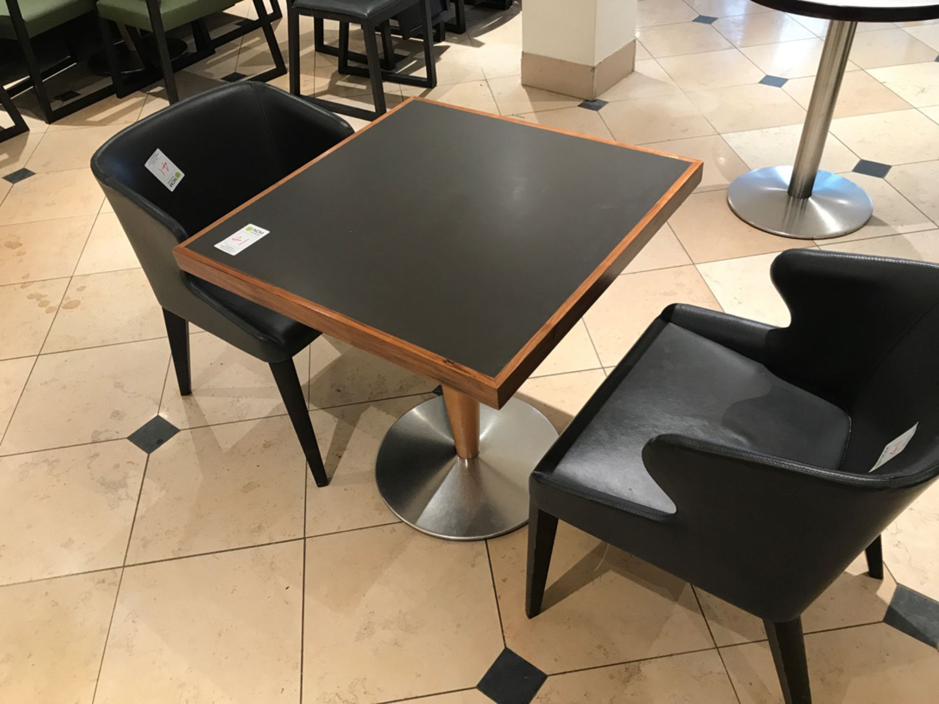 Modern square pedestal table with two chairs