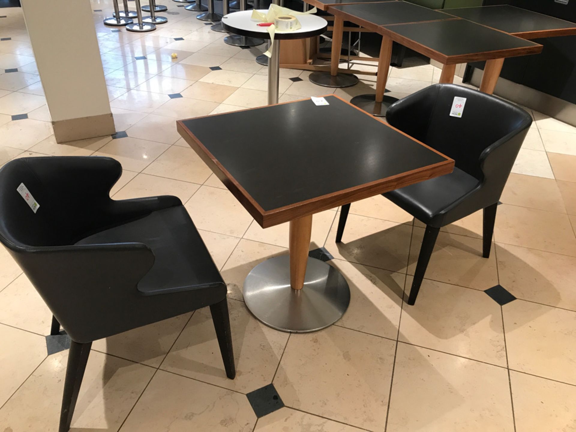 Modern pedestal table with two designer chairs