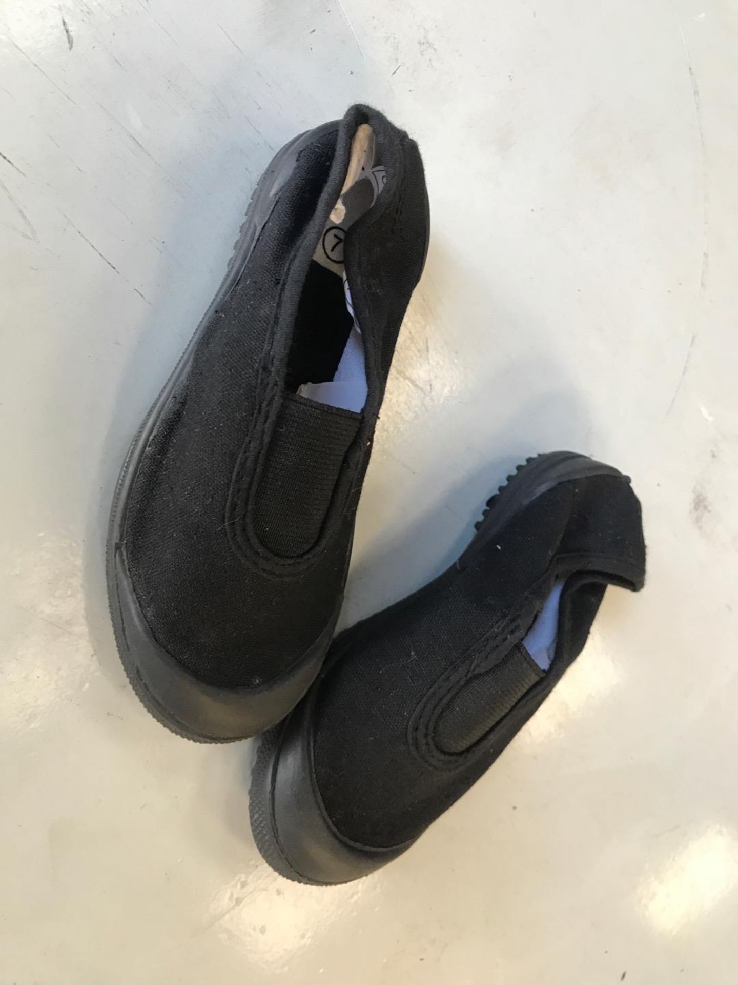 Childrens size 7 black plimsolls