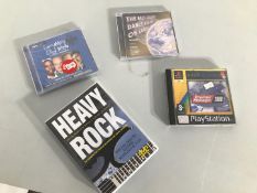 A selection of cds dvds and playstation games