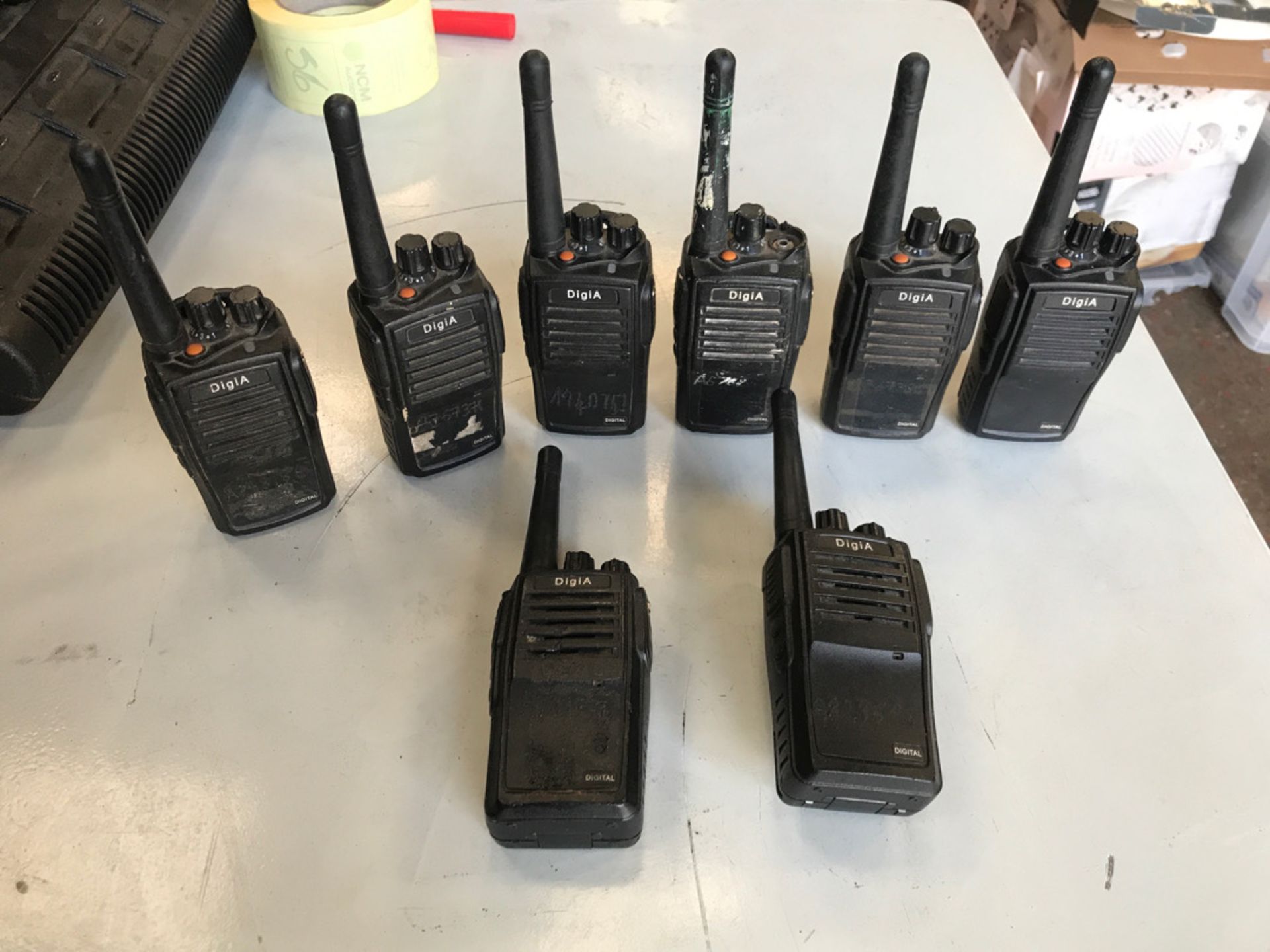 Digia handheld radios x8and a Motorola handheld radio NO RESERVE