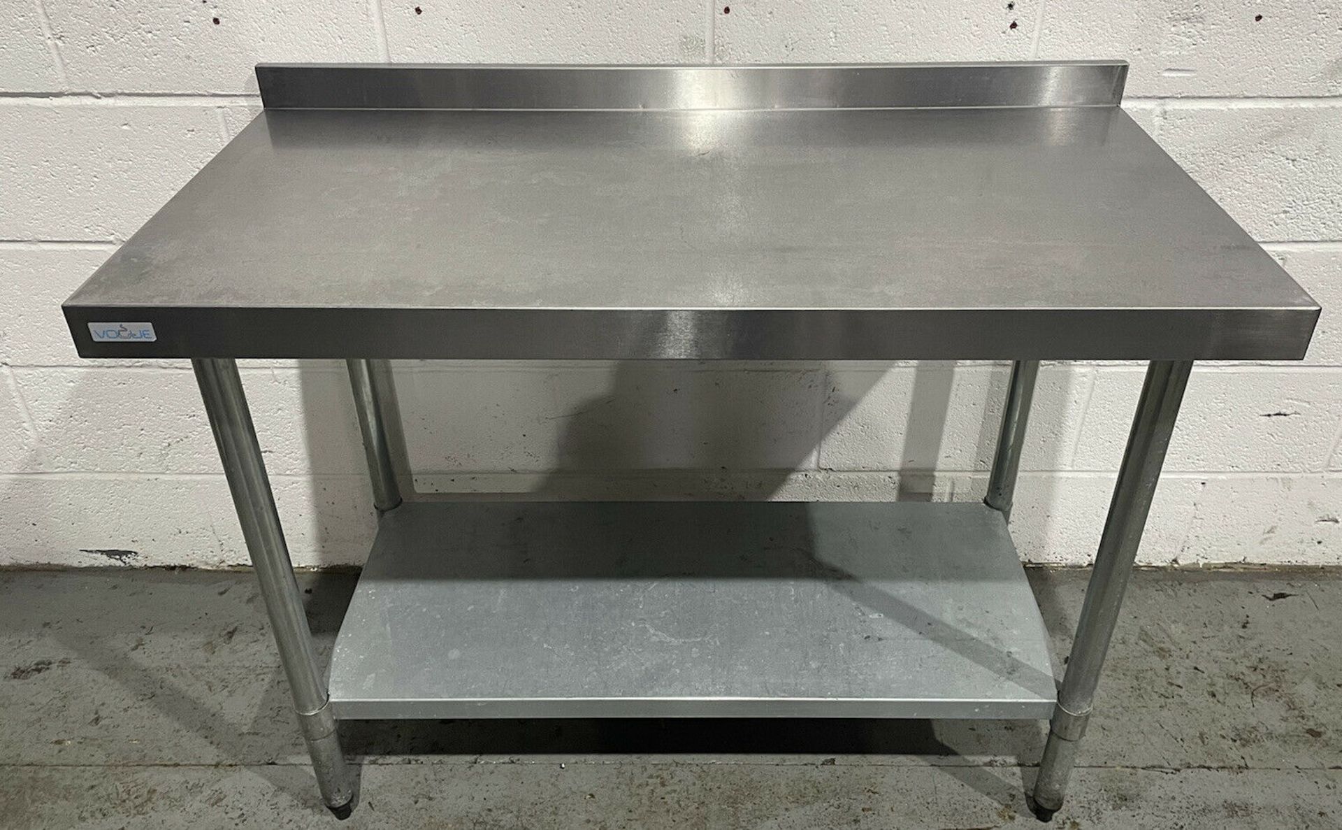 Stainless steel preperation table with upstand and