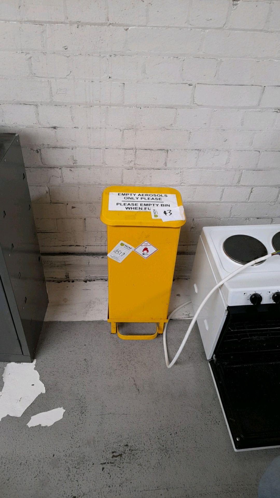 Small metal waste bin