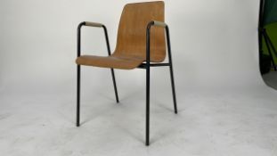 Wooden chair with metal bars