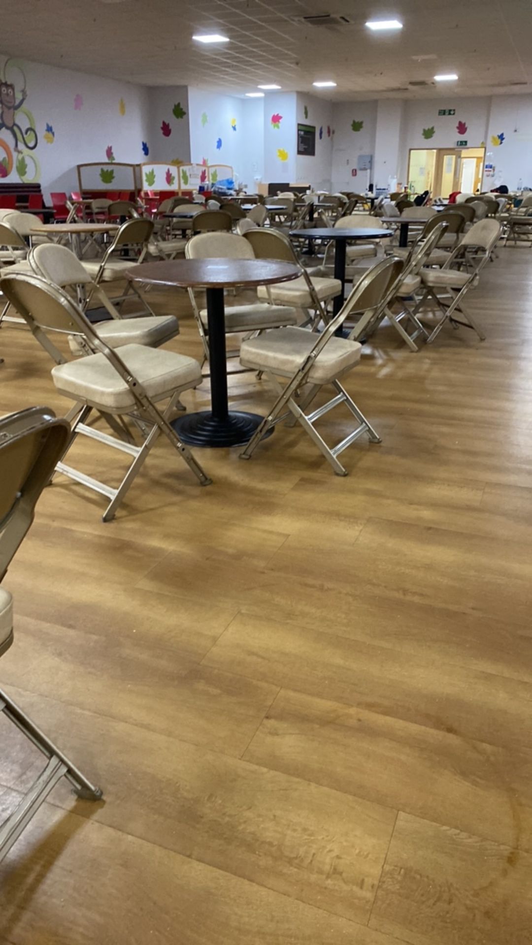 Entire row of circular tables and chairs - Image 2 of 3