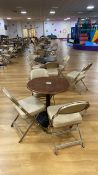 Entire row of circular tables and chairs