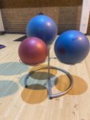 Exercise ball stand , including three balls.