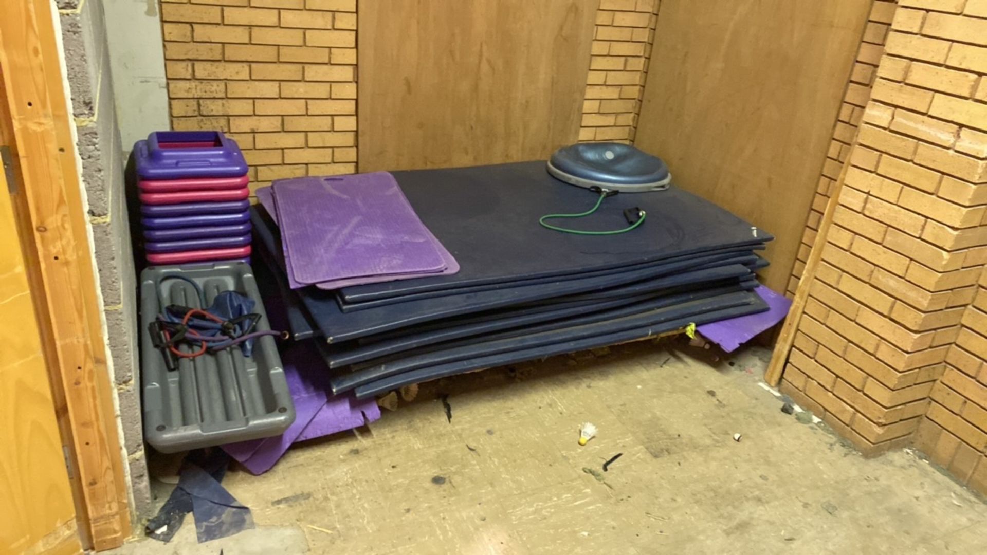 Assortment of gymnastic mats training bands and fi