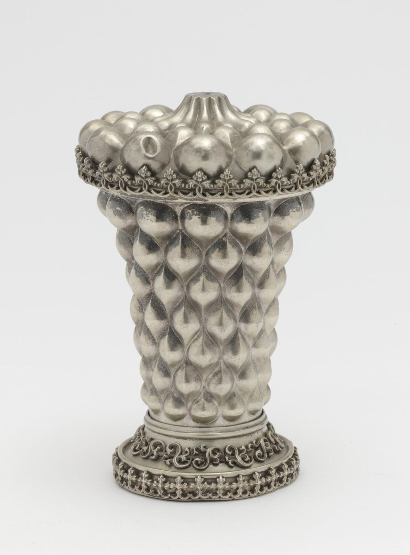 A goblet with bosses