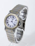 Cartier-Armbanduhr "Santos" Achteckiges Gehäuse und Armband aus Stahl, tlw. vergoldet. Runde