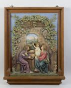 Deutsch, wohl 19. Jh. Altarrelief mit der Darstellung von Maria und Josef mit dem Jesuskind vor eine