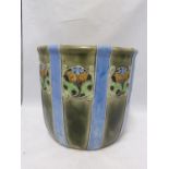 A large Royal Doulton stoneware jardiniere, bucket form and decorated by Annie Lyons with stripes