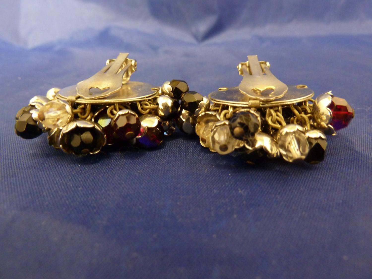 Butler & Wilson - a pair of early millefleur clip on earrings, circular base with wired metal floral - Image 4 of 4