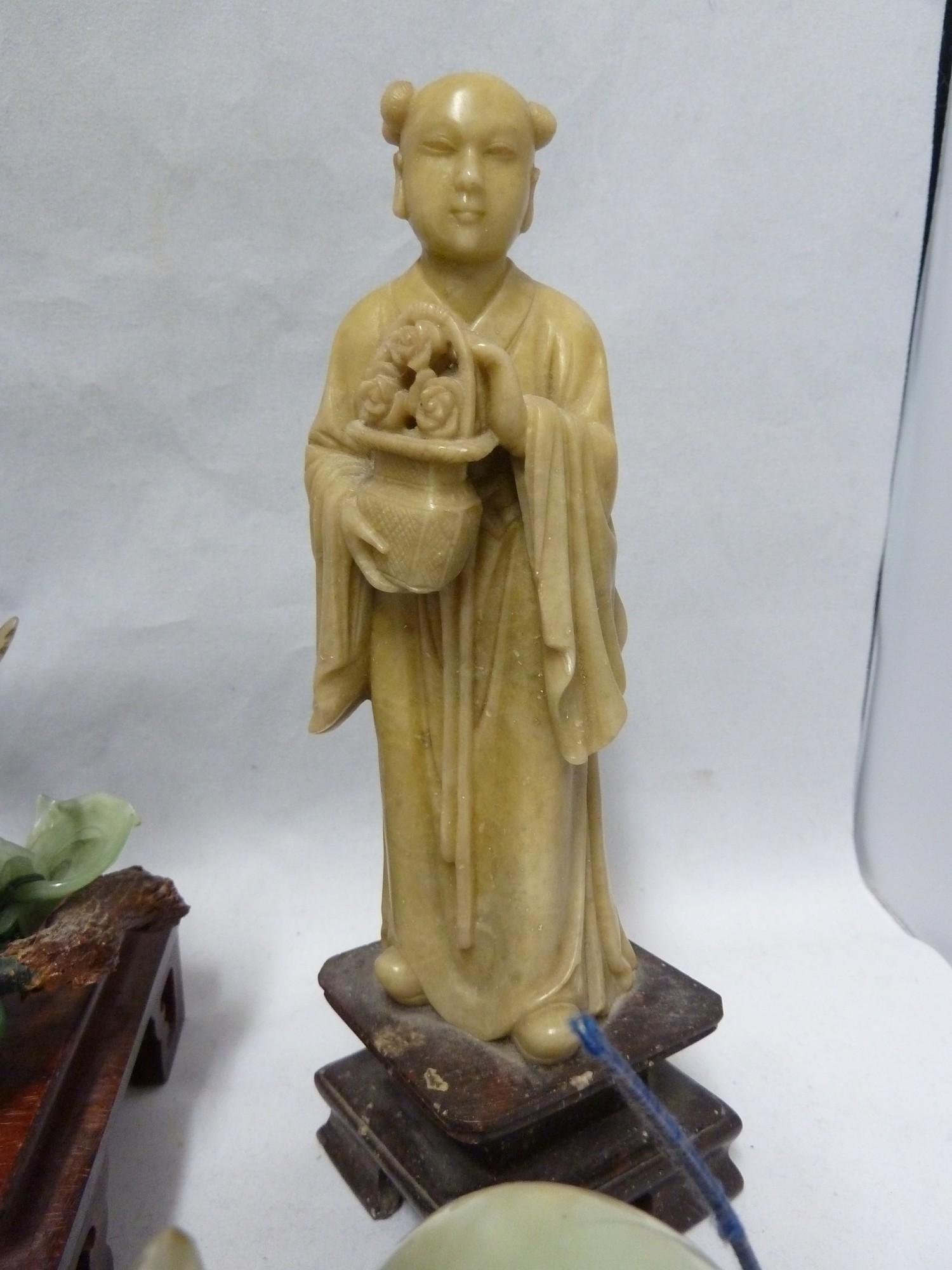 A Chinese soapstone figure of an immortal holding a pot plant; various glass and stone models of - Image 3 of 11