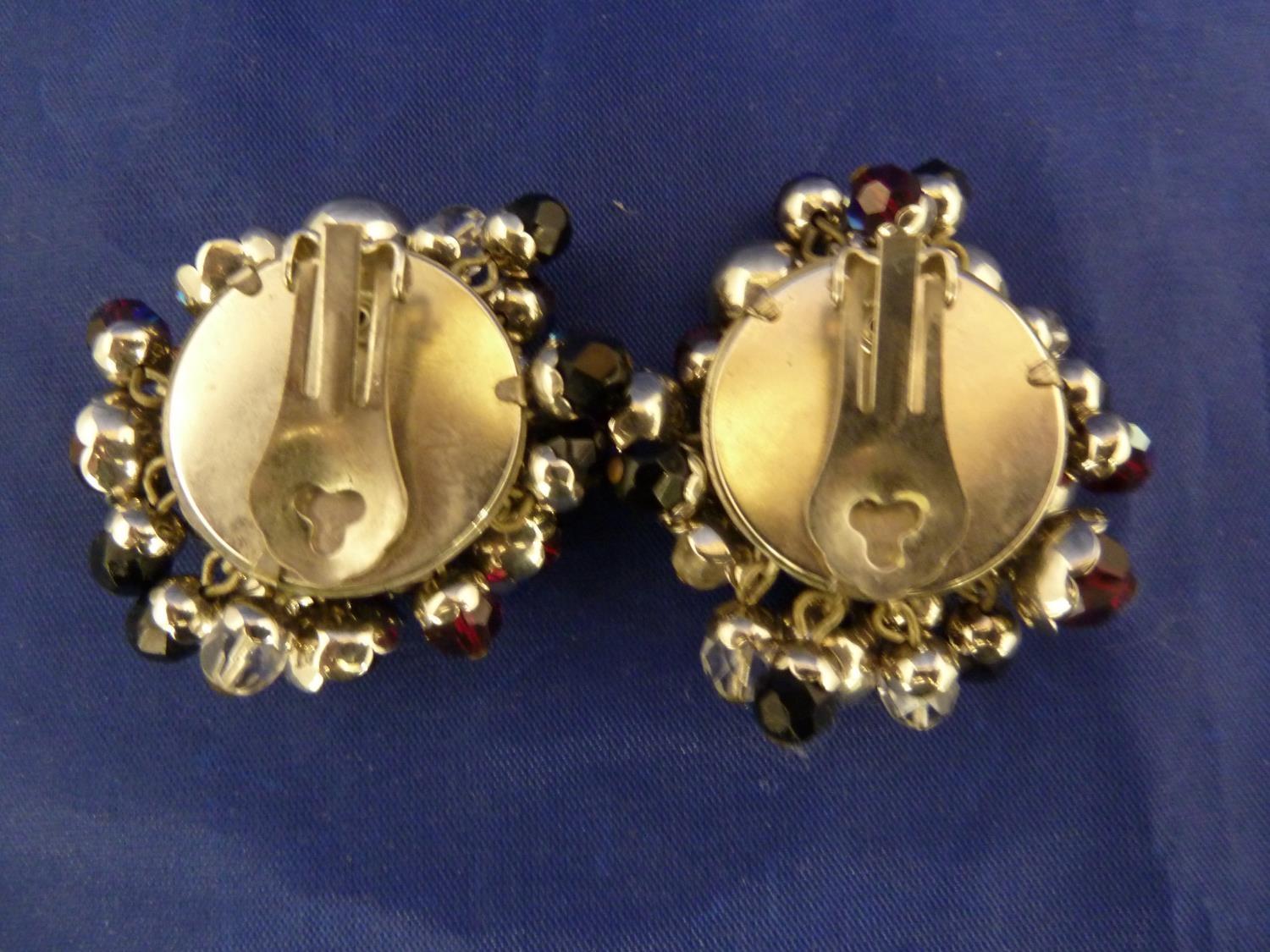Butler & Wilson - a pair of early millefleur clip on earrings, circular base with wired metal floral - Image 3 of 4