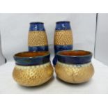 A pair of Royal Doulton stoneware vases, of gourd form, banded in gold with incised swirls between