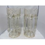 A pair of glass lustres, colourless glass, of typical form with cross- hatched bowls and feet,