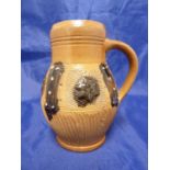 A Maskau, Germany saltglaze stoneware tankard, decorated with panels of incised cross hatching,