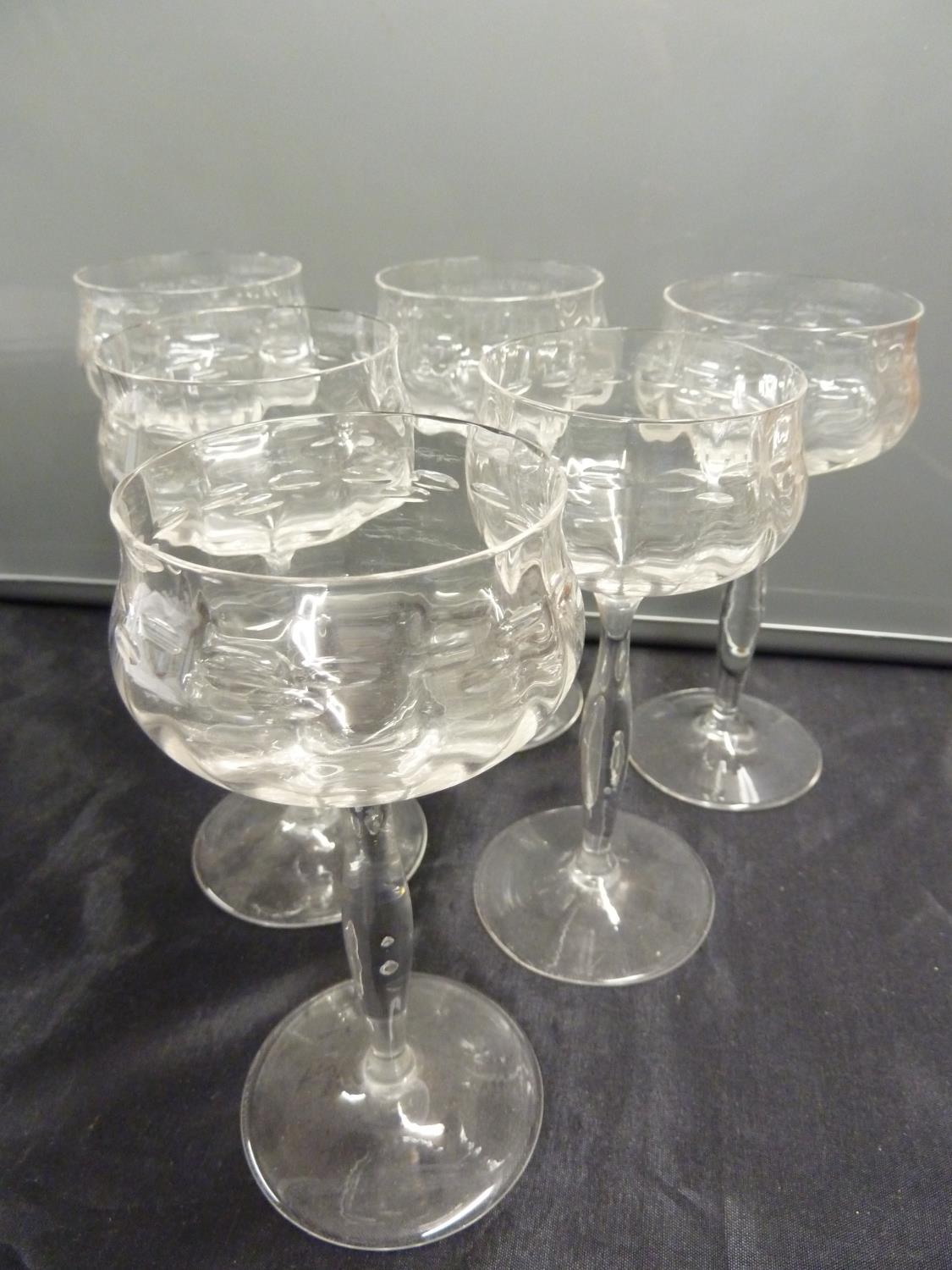 Bakalowits, Vienna designed by Kolomon Moser- six wine glasses, colourless glass, the lobed bowls