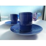Loretta Hui-shan Yang or Yang Huishan - two ribbed and blue glazed porcelain cups and saucers, the