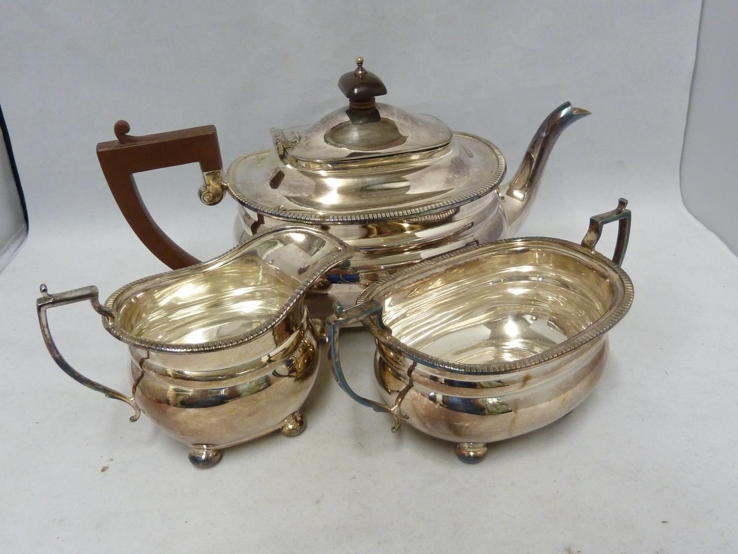 An Adie Brothers Limited silver plated tea service, comprising, teapot with hinged cover, milk jug