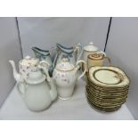 Two blue printed pottery jugs, with polychrome hand colouring; a Satsuma style coffee pot; 11 s