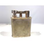 Dunhill - A Giant table cigarette lighter, silver plated engine turned body, stamped Dunhill