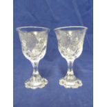 Thomas Webb - a pair of rock crystal wine glasses, the bowls of lobed fluted spirals cut with