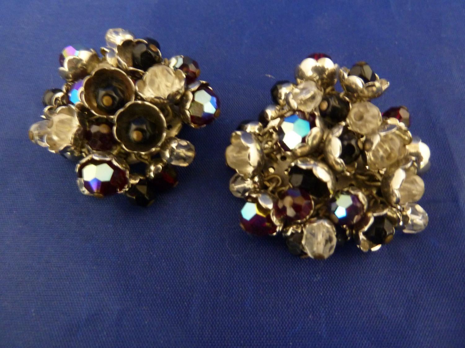 Butler & Wilson - a pair of early millefleur clip on earrings, circular base with wired metal floral