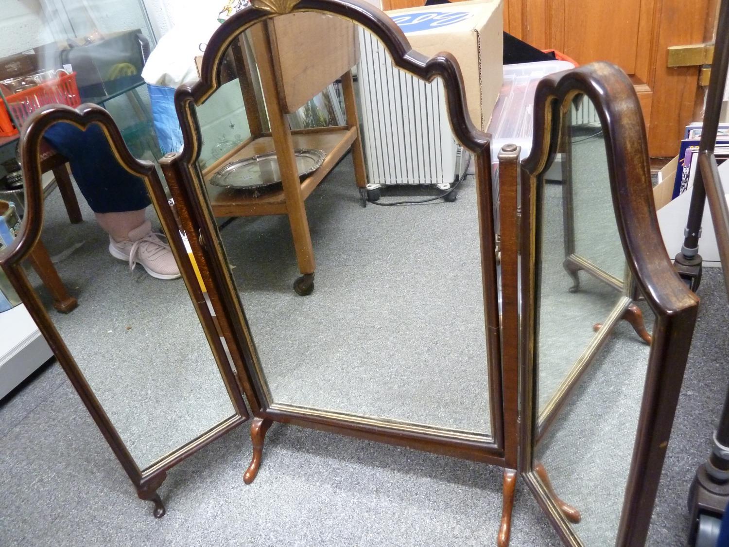 A folding vanity looking glass, in Georgian style, the central panel with scallop shell finial