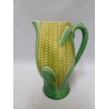 A majolica corn on the cob jug, naturalist colours with shell pink interior, unmarked, 19.5cm high