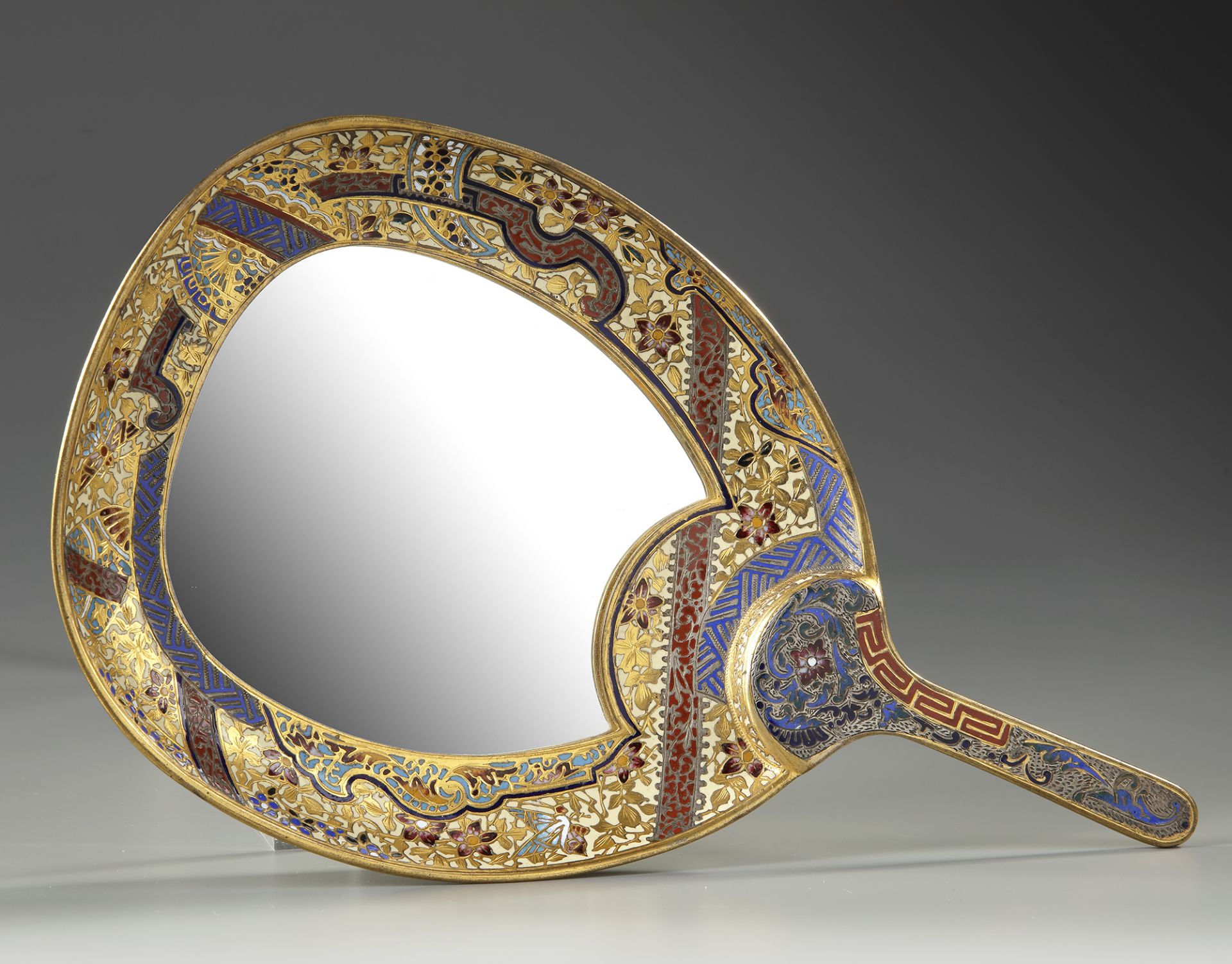 A FRENCH GILT BRONZE AND ENAMELED HAND MIRROR, 19TH CENTURY