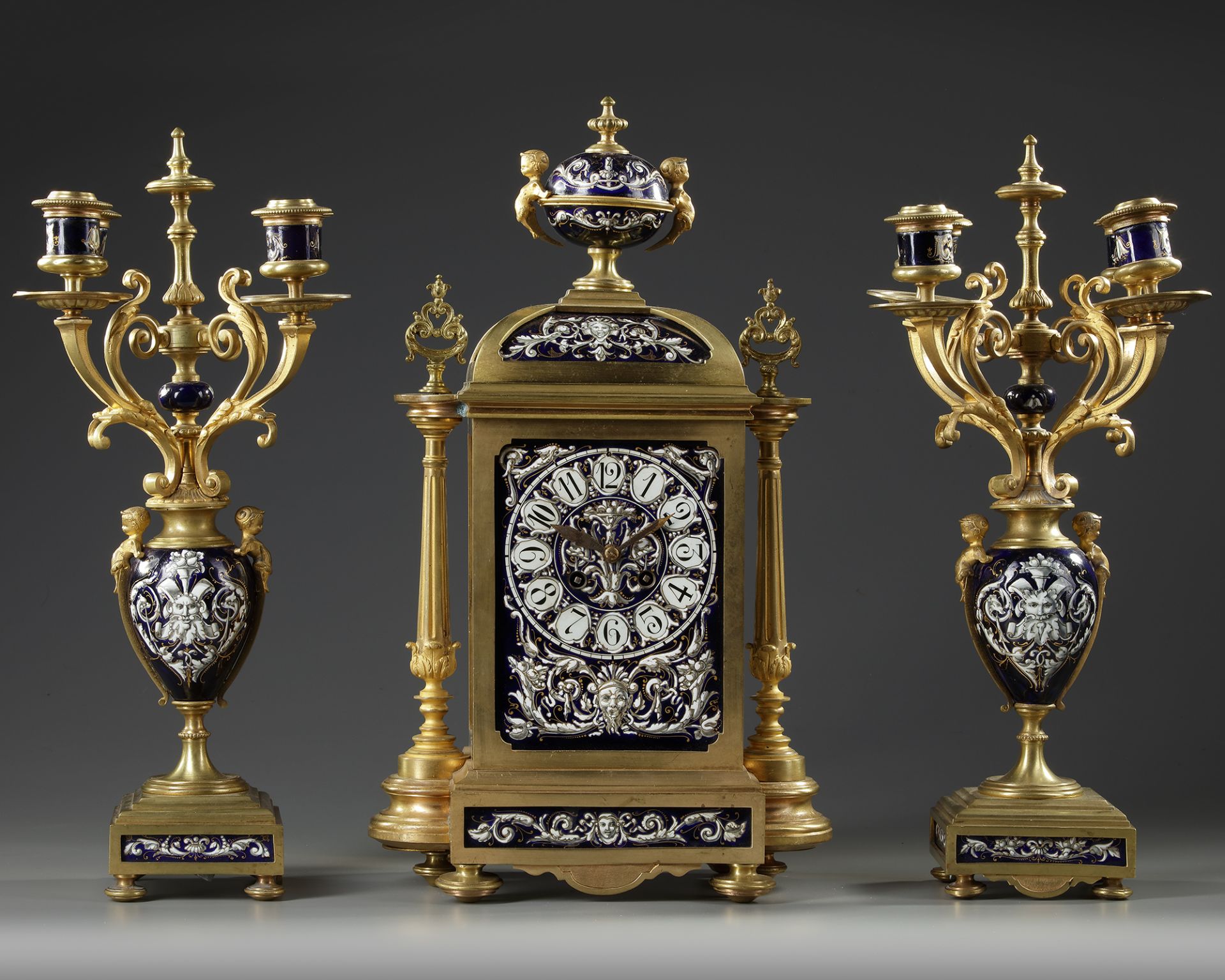 A FRENCH ORMOLU ENAMEL CLOCK SET, LATE 19TH CENTURY