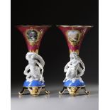 A PAIR OF FRENCH PORCELAIN AND BISCUIT VASES, 19TH CENTURY