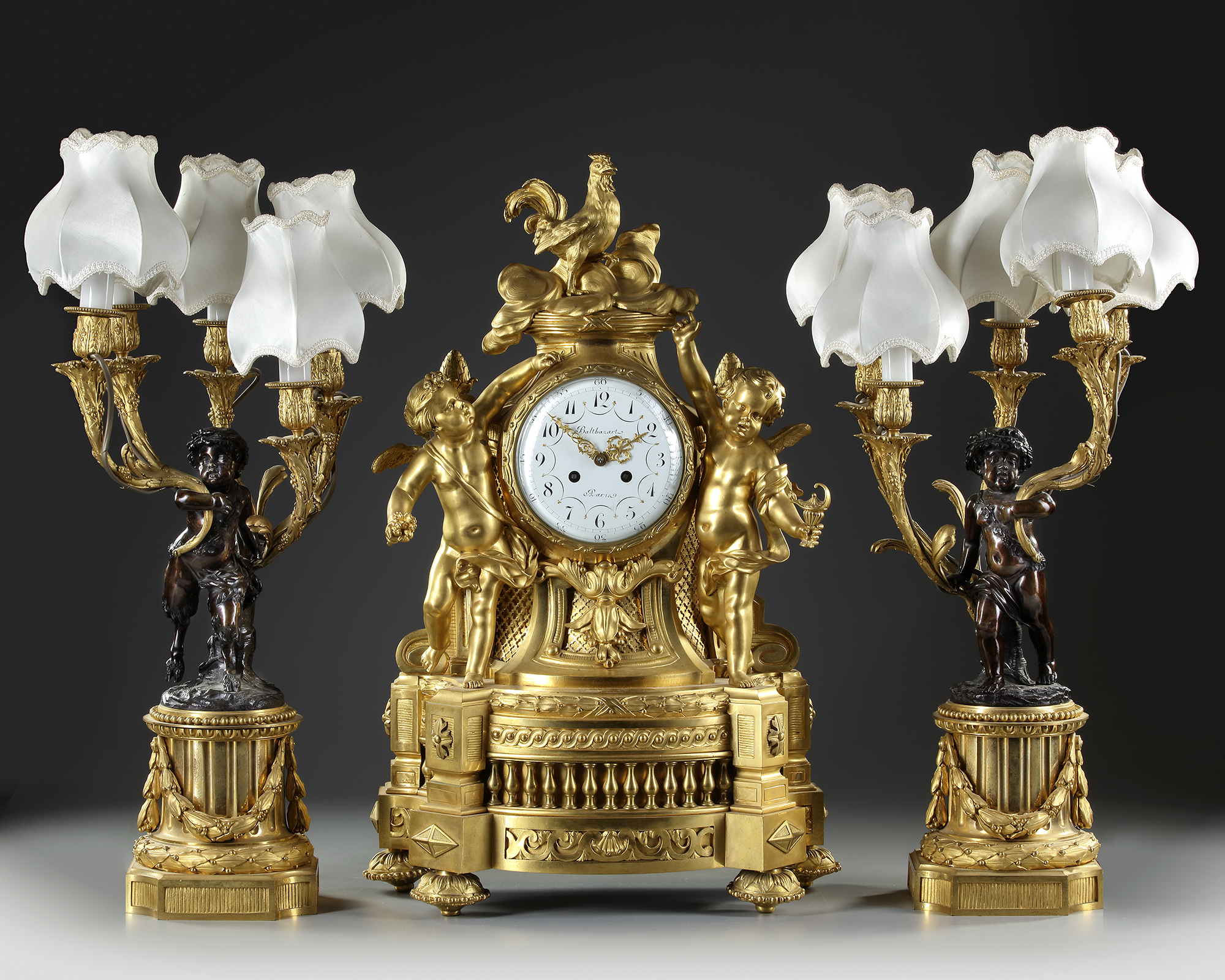 AN IMPORTANT GILT BRONZE CLOCK SET, FRANCE, 19TH CENTURY