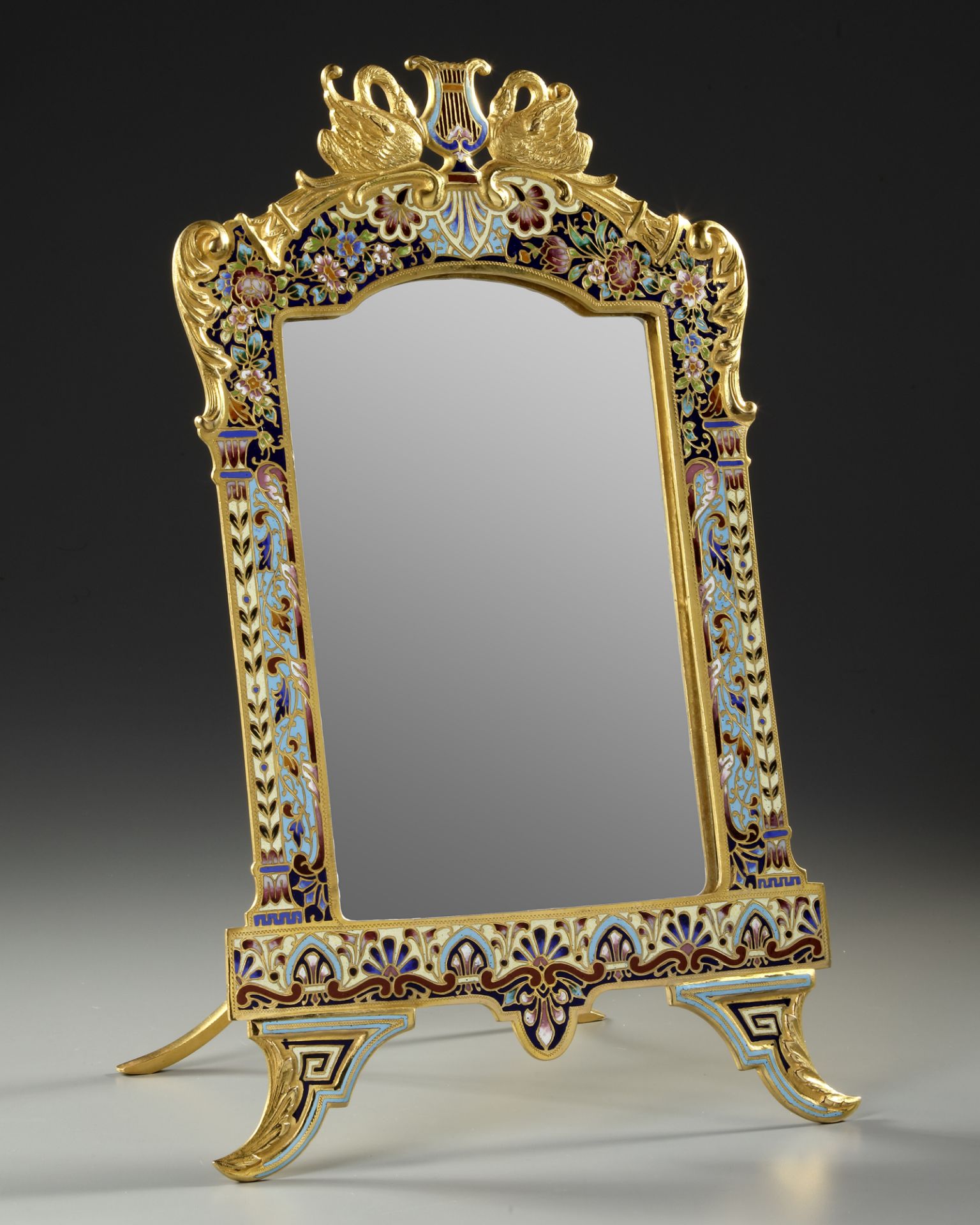 AN ORMOLU AND CHAMPLEVÉ ENAMEL TABLE MIROR, FRANCE, 19TH CENTURY